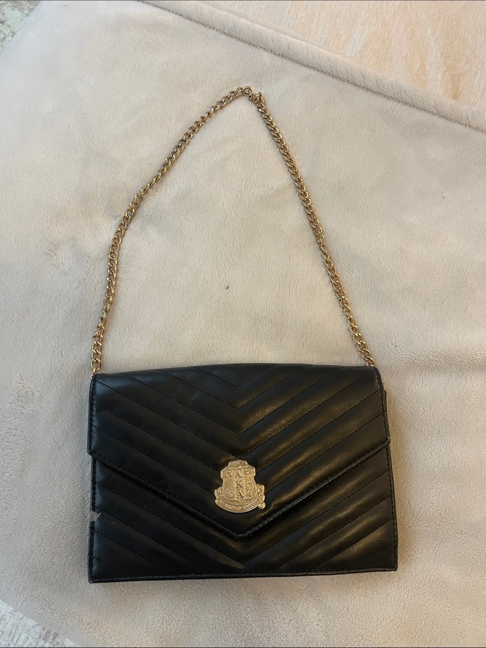 Black Quilted Chain Shoulder Bag with Gold Alpha Kappa Alpha Crest Hardware